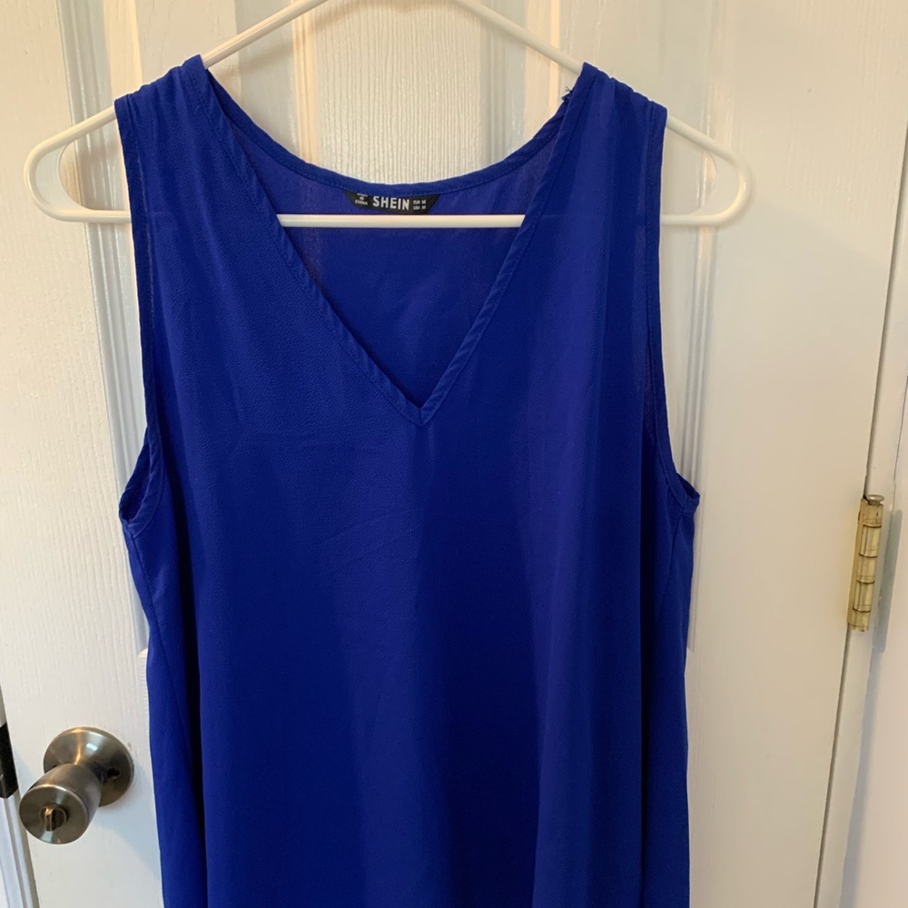 Royal blue tank top new condition in a size medium.